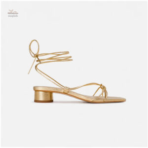 Sandale dorée avec design gladiateur élégant